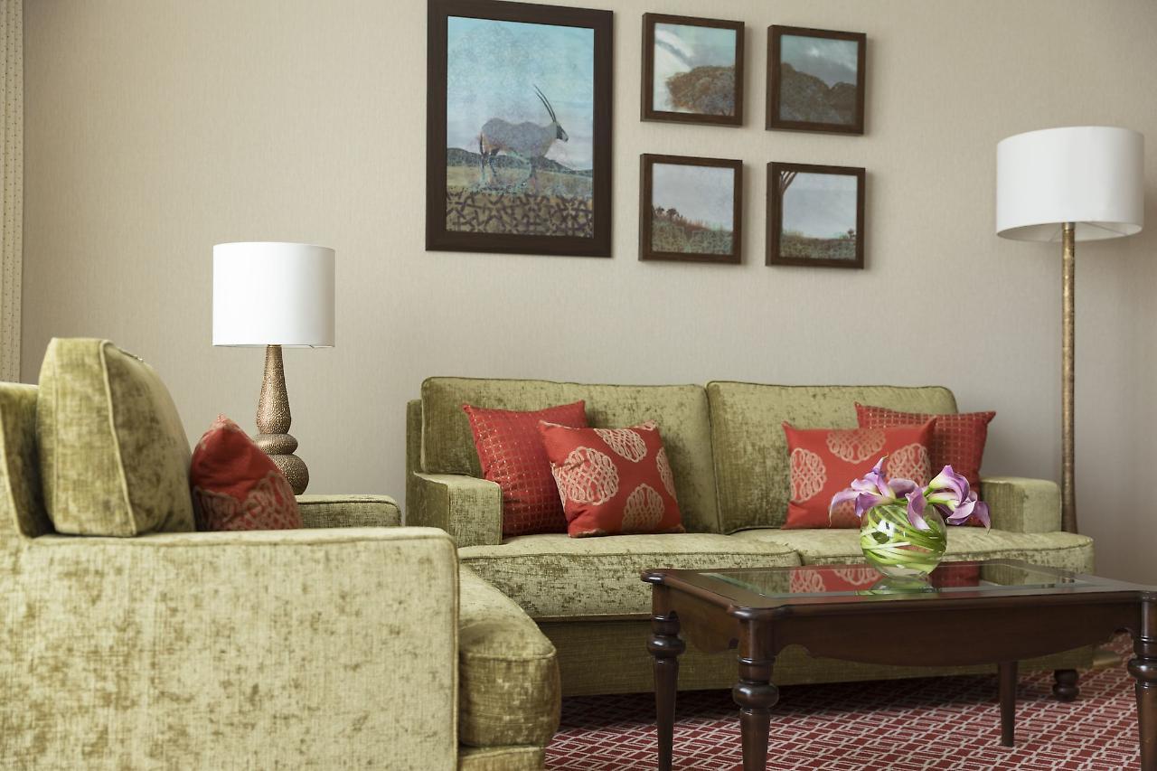 โรงแรมอัล นาจาดา โดฮา บาย ทิโวลี ภายนอก รูปภาพ A living room