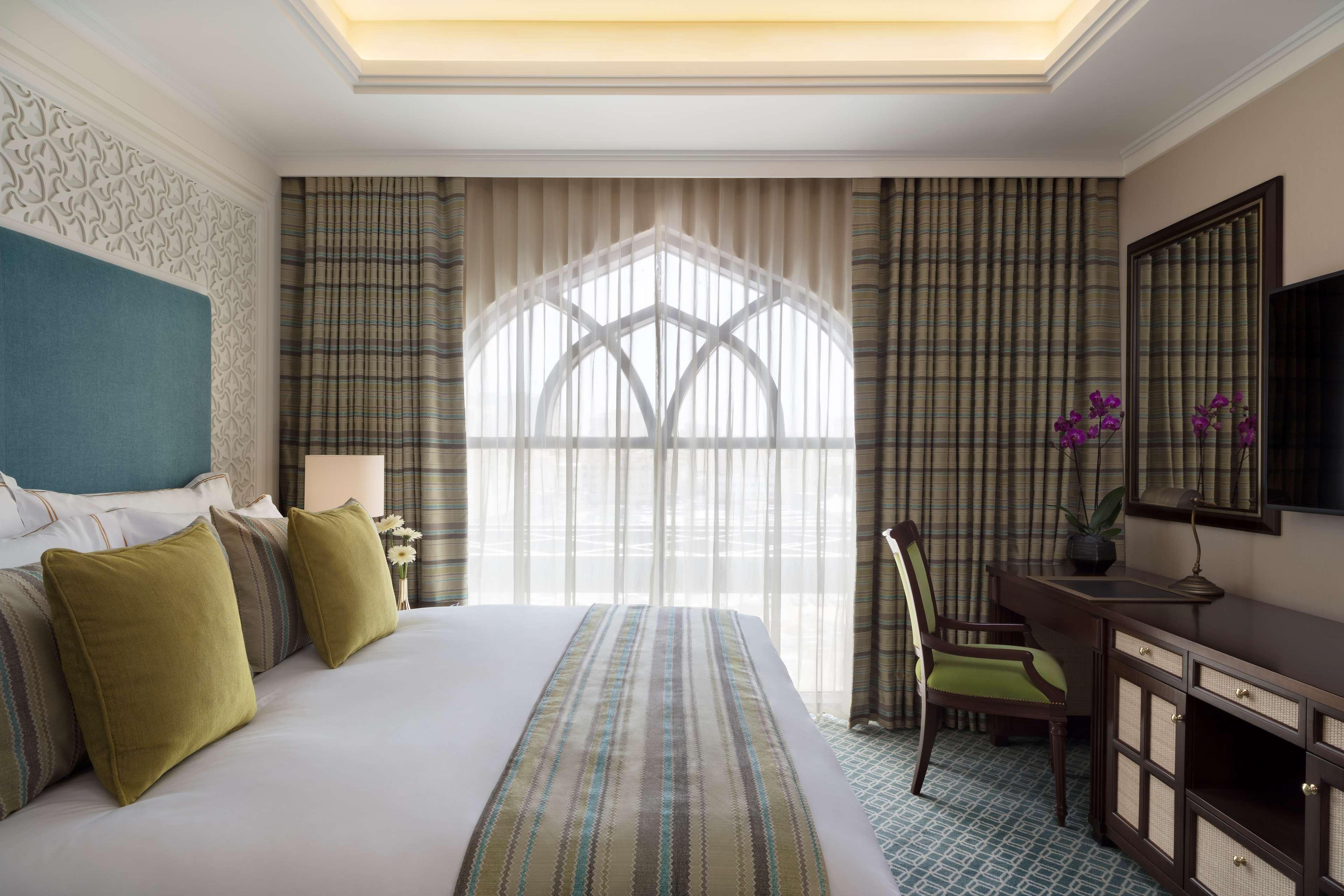 โรงแรมอัล นาจาดา โดฮา บาย ทิโวลี ภายนอก รูปภาพ A bedroom at the hotel