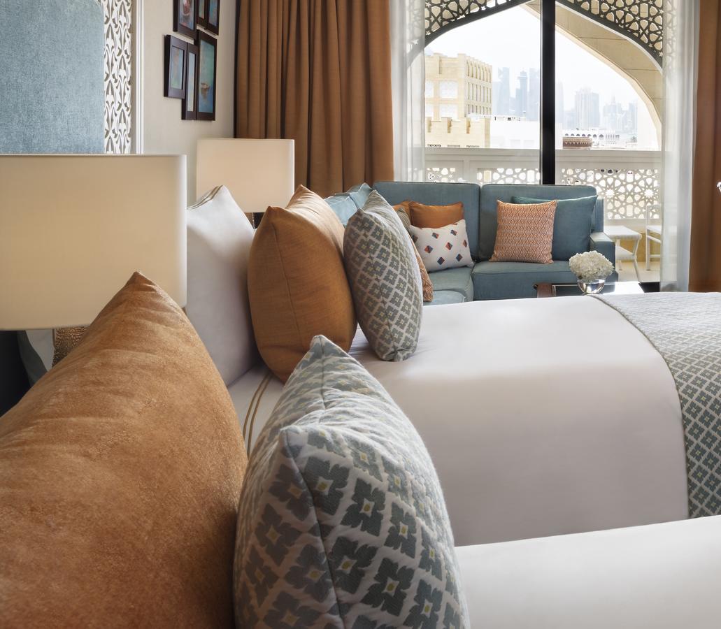 โรงแรมอัล นาจาดา โดฮา บาย ทิโวลี ภายนอก รูปภาพ A bedroom at the hotel